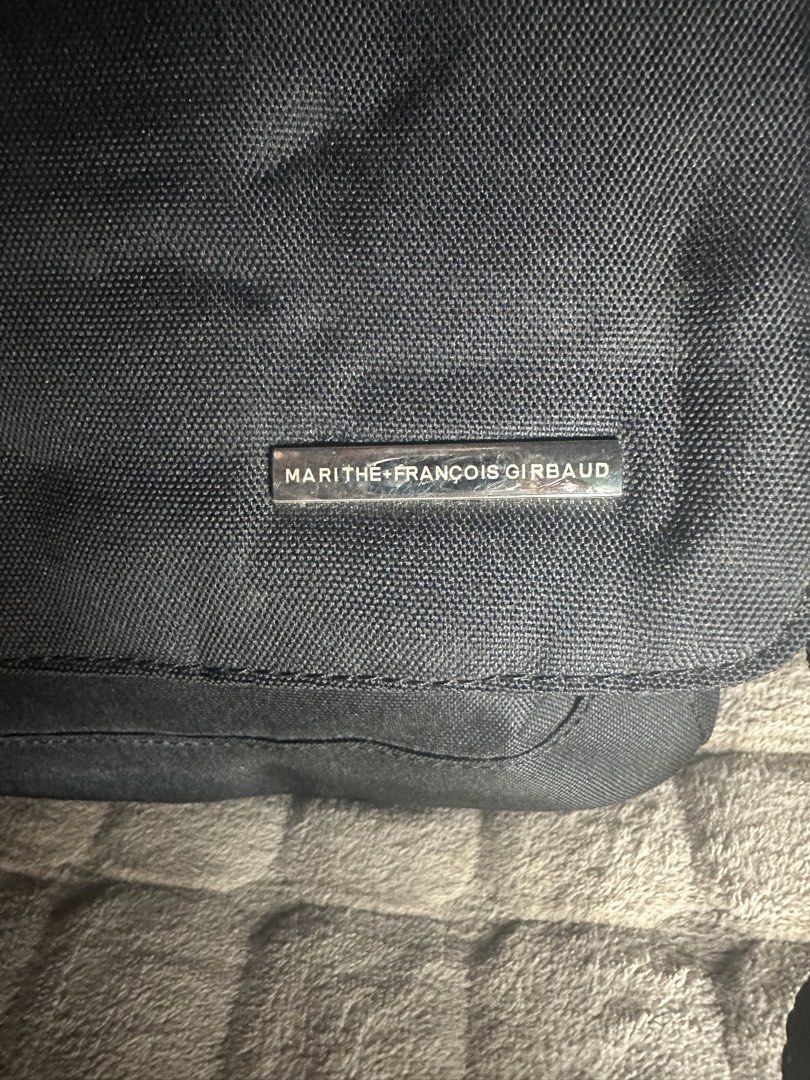 Marithe + Francois Girbaud NEU Messenger Bag (Category: Laptop Bags & Sleeves) located in Manila. Submitted by geosclosetdecluttering (Listing ID 1456845582, Image 2). Description: - Used as a laptop bag - Very minimal signs of usage (minor scratches at the metal logo bag tag) - 9.5/10.