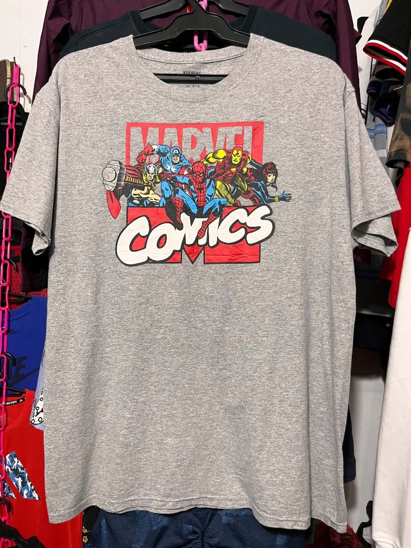 Marvel Comics Graphic T-Shirt Grey Size L (Category: Tshirts & Polo Shirts ) located in Manila. Submitted by _lemornosnas02 (Listing ID 1456796690, Image 1). Description: - Grey Marvel Comics T-shirt - Features classic Avengers: Iron Man, Captain America, Spider-Man, Thor, Black Widow - Material: Cotton and Polyester Blend - Size: Large (L) - Eye-catching graphic print - Perfect for any Marvel fan! -location iloilo -plus ship via lbc -no crack pr