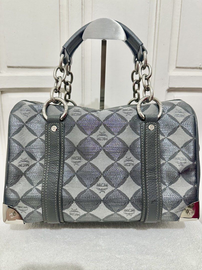 MCM BOSTON SATCHEL BAG - Authentic 👍🏻❤️🥰 (Category: Purses & Pouches) located in Marikina City. Submitted by rizza_35 (Listing ID 1456796494, Image 2). Description: 😍Vintage Silver Metallic Jacquard 😘Dark Gray leather trim 🥰 Chunky Chain Silver hardwares Condition : Very good .