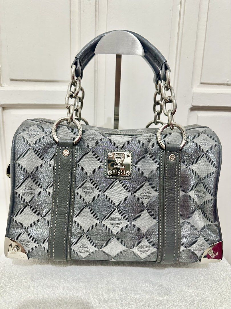 MCM BOSTON SATCHEL BAG - Authentic 👍🏻❤️🥰 (Category: Purses & Pouches) located in Marikina City. Submitted by rizza_35 (Listing ID 1456796494, Image 1). Description: 😍Vintage Silver Metallic Jacquard 😘Dark Gray leather trim 🥰 Chunky Chain Silver hardwares Condition : Very good .