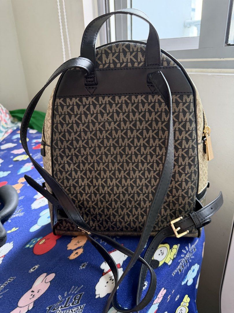 MK bagpack (Category: Luxury Bags & Wallets) located in Quezon City. Submitted by jshkh (Listing ID 1456830498, Image 2). Description: Original Nasa pic na po ang issue What you see is what you get With dustbag Medium size For pick up or delivery only RFS: declutter .