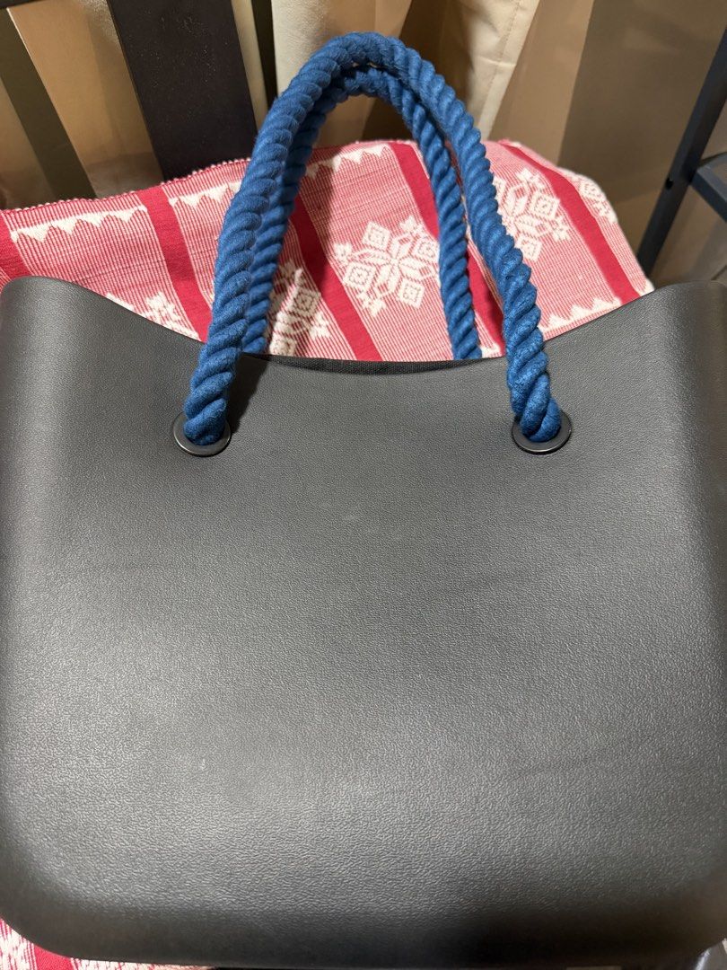 Modern Folk Tote Bag with Rope Handles (Category: Tote Bags) located in Cavite. Submitted by carizhai (Listing ID 1456905272, Image 3). Description: - Black medium tote bag from Modern Folk (local brand), popular in the early 2020s - Features thick blue rope handles with extra black rope handles - Interior zippered compartment (detachable) - Ideal for everyday use esp in this rainy season (water repellent) - Spacious for your essentials; perfect 
