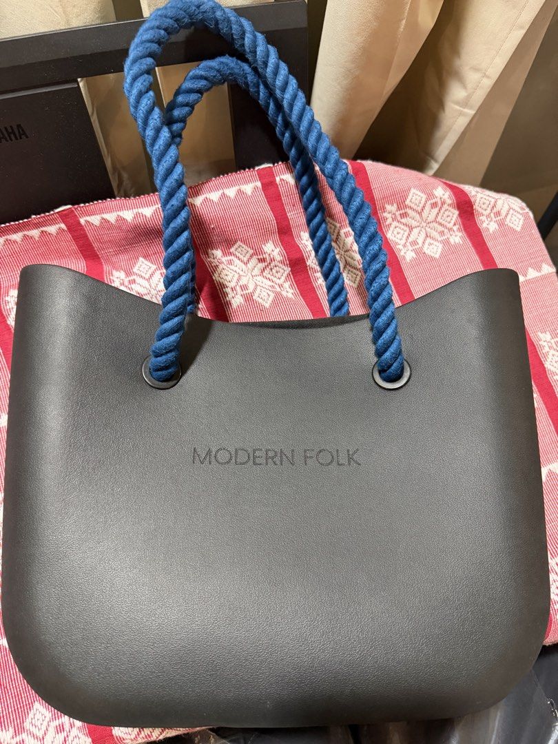 Modern Folk Tote Bag with Rope Handles (Category: Tote Bags) located in Cavite. Submitted by carizhai (Listing ID 1456905272, Image 1). Description: - Black medium tote bag from Modern Folk (local brand), popular in the early 2020s - Features thick blue rope handles with extra black rope handles - Interior zippered compartment (detachable) - Ideal for everyday use esp in this rainy season (water repellent) - Spacious for your essentials; perfect 