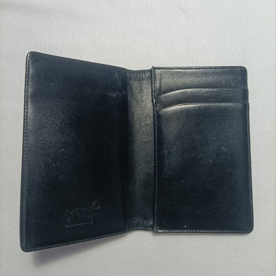 Mont Blanc Black Leather Card Holder (Category: Luxury Bags & Wallets) located in Manila. Submitted by _bluberr (Listing ID 1456923225, Image 3). Description: - Genuine Mont Blanc card holder - Crafted from premium black leather - Features multiple slots for essential cards - Subtle Mont Blanc logo embossed inside - Perfect for keeping your cards neatly organized - A timeless and elegant accessory.