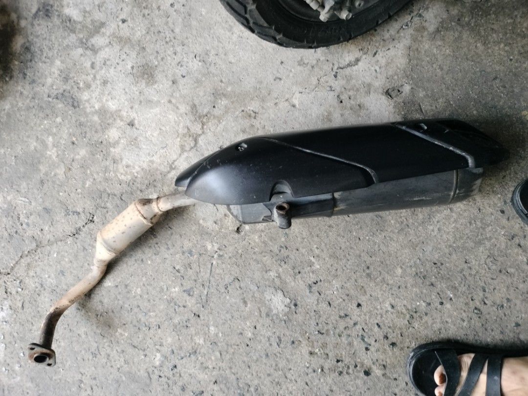 Motorcycle Exhaust Pipe for Yamaha NMAX (Category: Construction & Building Materials) located in Pasig City. Submitted by wenaquilay (Listing ID 1456949160, Image 3). Description: - Stock exhaust pipe for Yamaha NMAX/aerox - Removed from aerox - Muffler cover is black plastic - Still functional - Selling as is.