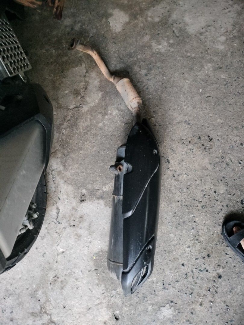 Motorcycle Exhaust Pipe for Yamaha NMAX (Category: Construction & Building Materials) located in Pasig City. Submitted by wenaquilay (Listing ID 1456949160, Image 1). Description: - Stock exhaust pipe for Yamaha NMAX/aerox - Removed from aerox - Muffler cover is black plastic - Still functional - Selling as is.