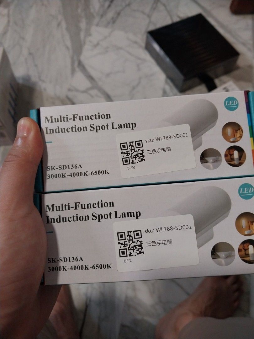 Multi function induction spot lamp (Category: Lighting) located in Singapore. Submitted by swiftpenguin_21e00f (Listing ID 1456849969, Image 1). Description: - Multi-Function Induction Spot Lamp - Model: SK-SD136A - Features induction technology for automatic lighting strictly self collect 907 jurong west st 91 or postage speedpost registered +6sgd - Offers three color temperature options: 3000K, 4000K, and 6500K - Sleek and modern design.