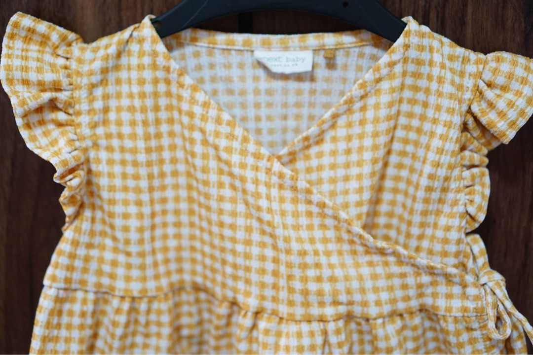 Next Baby Yellow Gingham Wrap Top (Category: Babies & Kids Fashion) located in Bacoor. Submitted by catpicks (Listing ID 1456858517, Image 2). Description: Yellow gingham wrap top from Next Baby Barely used, really pretty! Shipping via LBC, php 64 door to door..