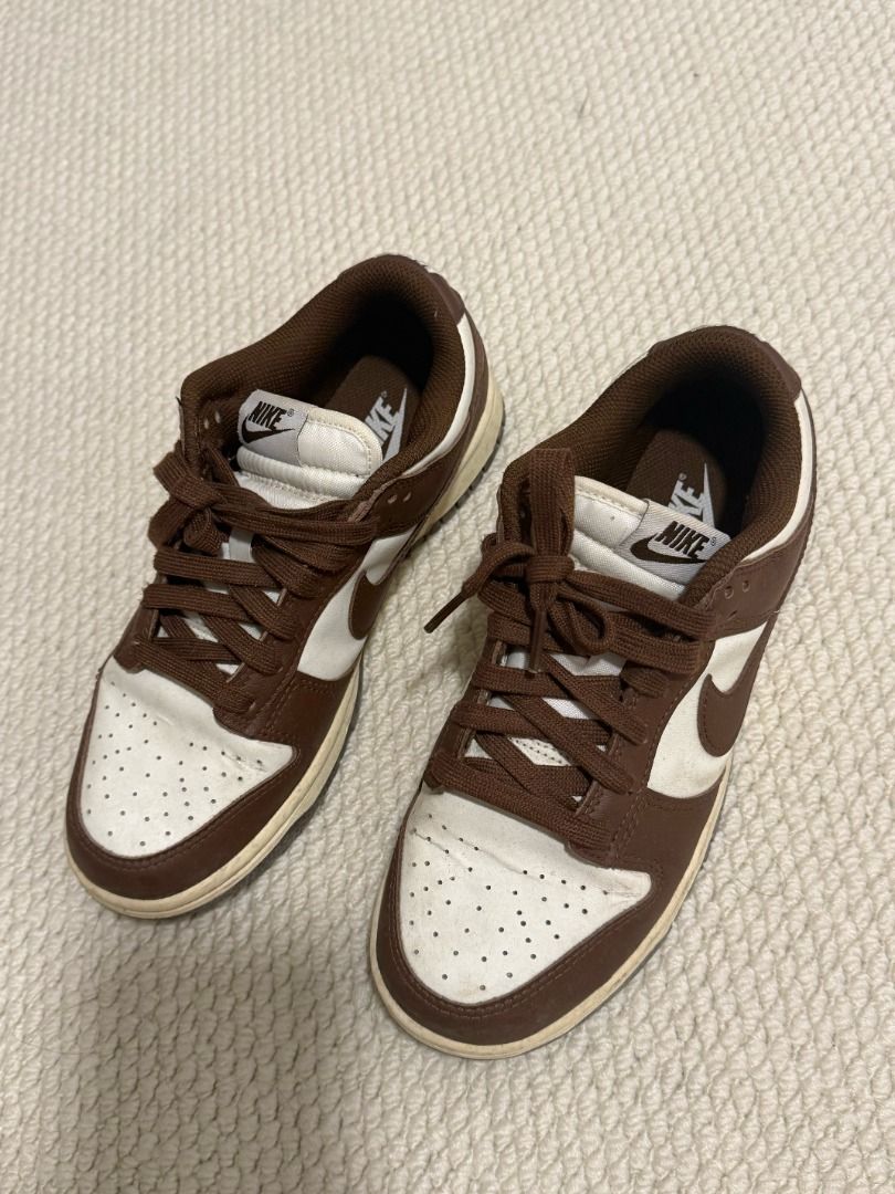 Nike Dunk Low Chocolate White Brown (Category: Sneakers) located in Makati City. Submitted by secondmuse_ (Listing ID 1456806914, Image 1). Description: - Classic Nike Dunks - Low-top silhouette - Brown and white colorway - Creamy off-white soles - Brown laces - Perfect for everyday wear - Minor signs of use on soles and toe box - Plenty of life remaining Size UK 5 / EUR 38.5.