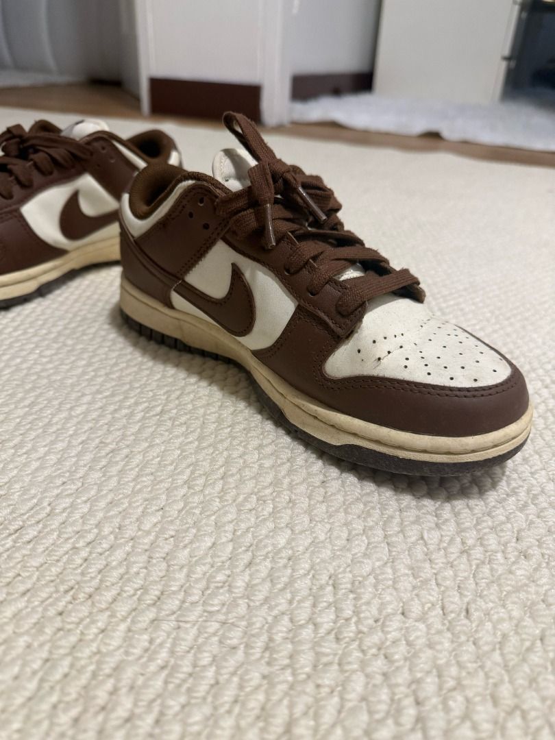 Nike Dunk Low Chocolate White Brown (Category: Sneakers) located in Makati City. Submitted by secondmuse_ (Listing ID 1456806914, Image 3). Description: - Classic Nike Dunks - Low-top silhouette - Brown and white colorway - Creamy off-white soles - Brown laces - Perfect for everyday wear - Minor signs of use on soles and toe box - Plenty of life remaining Size UK 5 / EUR 38.5.