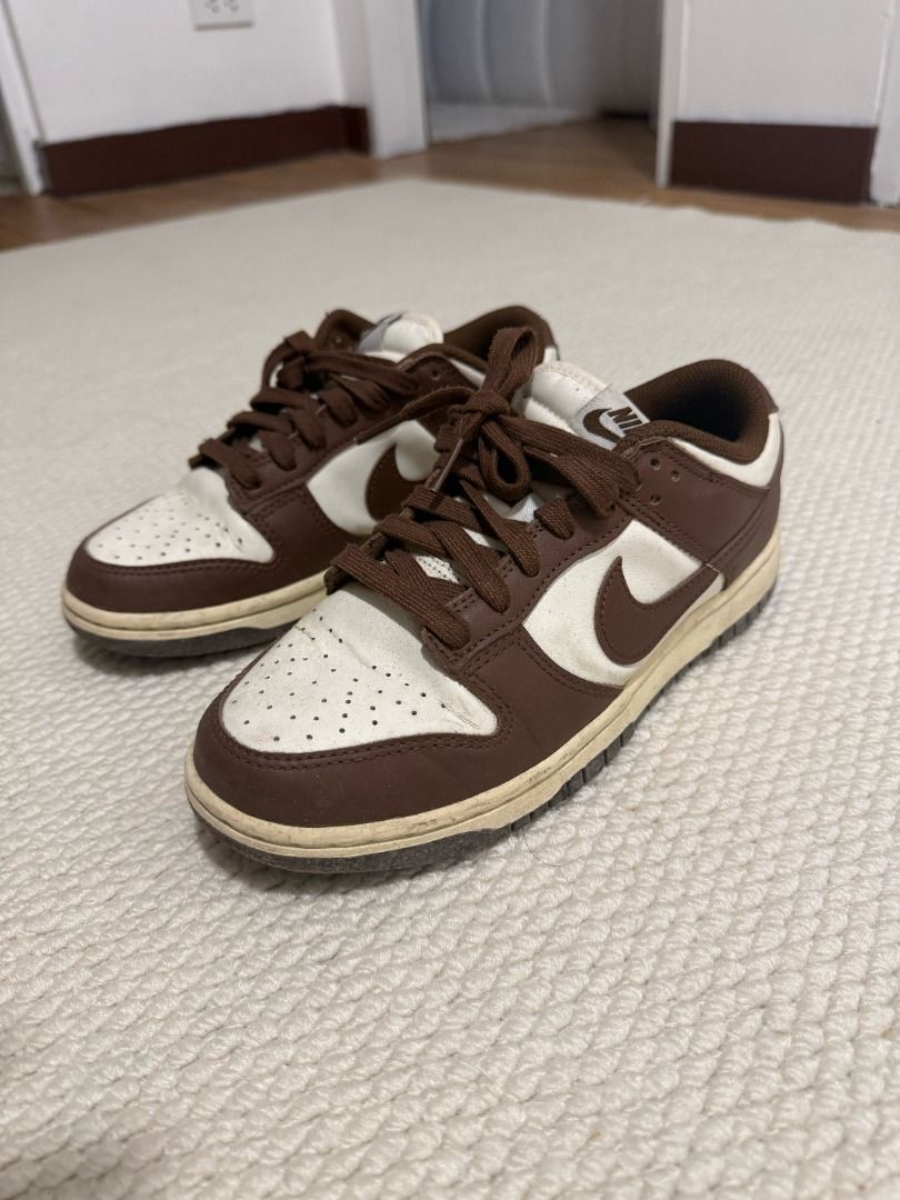 Nike Dunk Low Chocolate White Brown (Category: Sneakers) located in Makati City. Submitted by secondmuse_ (Listing ID 1456806914, Image 2). Description: - Classic Nike Dunks - Low-top silhouette - Brown and white colorway - Creamy off-white soles - Brown laces - Perfect for everyday wear - Minor signs of use on soles and toe box - Plenty of life remaining Size UK 5 / EUR 38.5.