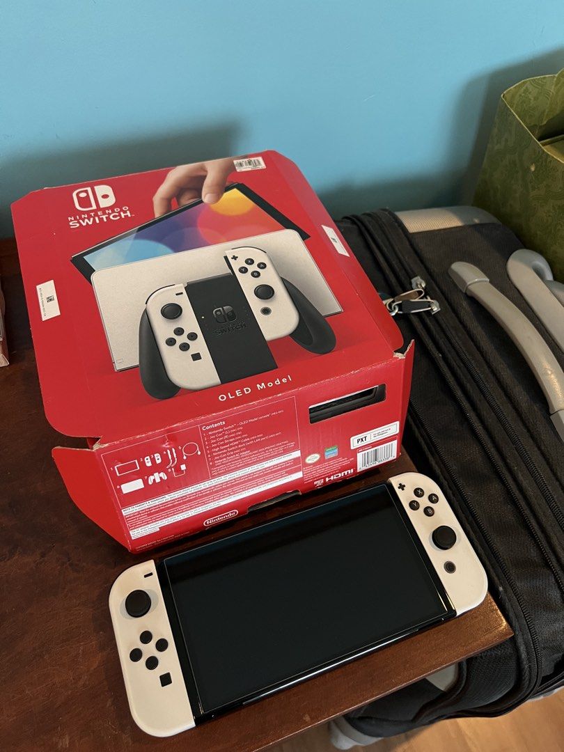 Nintendo Switch OLED White (Category: Nintendo) located in Paranaque City. Submitted by vincebenedicto (Listing ID 1456823218, Image 2). Description: For Sale Selling my Nintendo Switch OLED White Complete with original accessories and box Nintendo Switch original dock Joy-Con wrist straps Joy-Con grip Original HDMI cable Original Nintendo charger Everything works no issues Barely used Still in factory condition not jail broken game included - Ho