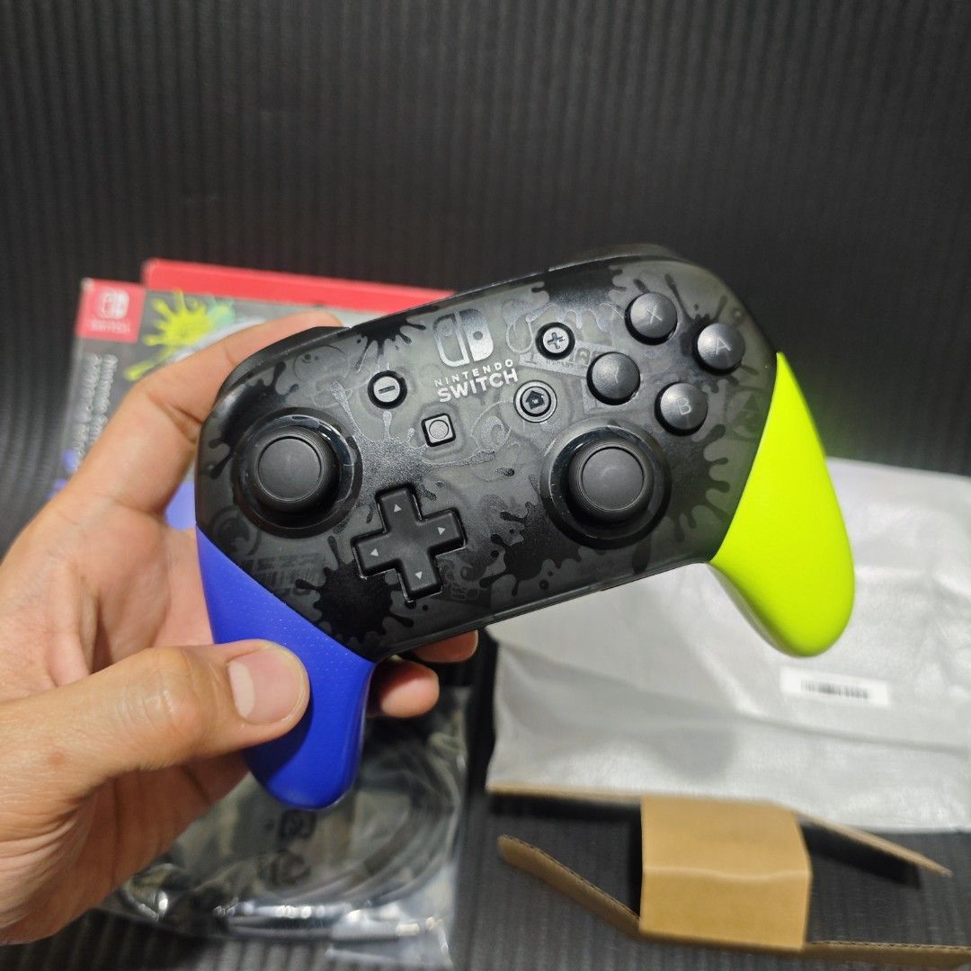 Nintendo Switch Pro Controller Splatoon Edition (Brandnew Condition) (Category: Controllers) located in Quezon City. Submitted by shopme_gadget30 (Listing ID 1456923323, Image 3). Description: kindly read the details first for sale fixed price mint Condition tested and working no drifting all buttons working with box with unused cable type C compatible to Nintendo switch Shoopppppeee —,✅ can check out pm for the linnnkkk (If shoopppee check out, 