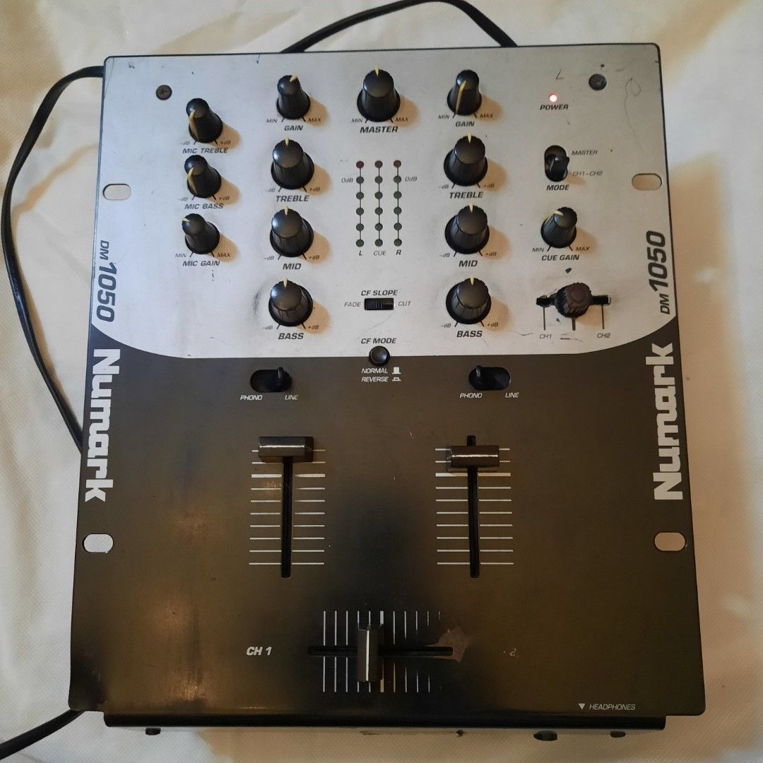 Numark DM 1050 DJ Mixer (Category: Other Audio Equipment) located in Quezon City. Submitted by cheap-finds (Listing ID 1456887260, Image 1). Description: NUMARK DM1050 DJ MIXER — 2-CHANNEL ₱4,000 - fixed price Pre-owned Numark DM1050 2-channel DJ mixer. A classic, straightforward DJ mixer suitable for home use, practice, casual DJing, or collectors of older DJ equipment. FEATURES: • 2-channel mixer • Phono/Line inputs • 3-band EQ per channel • Mi