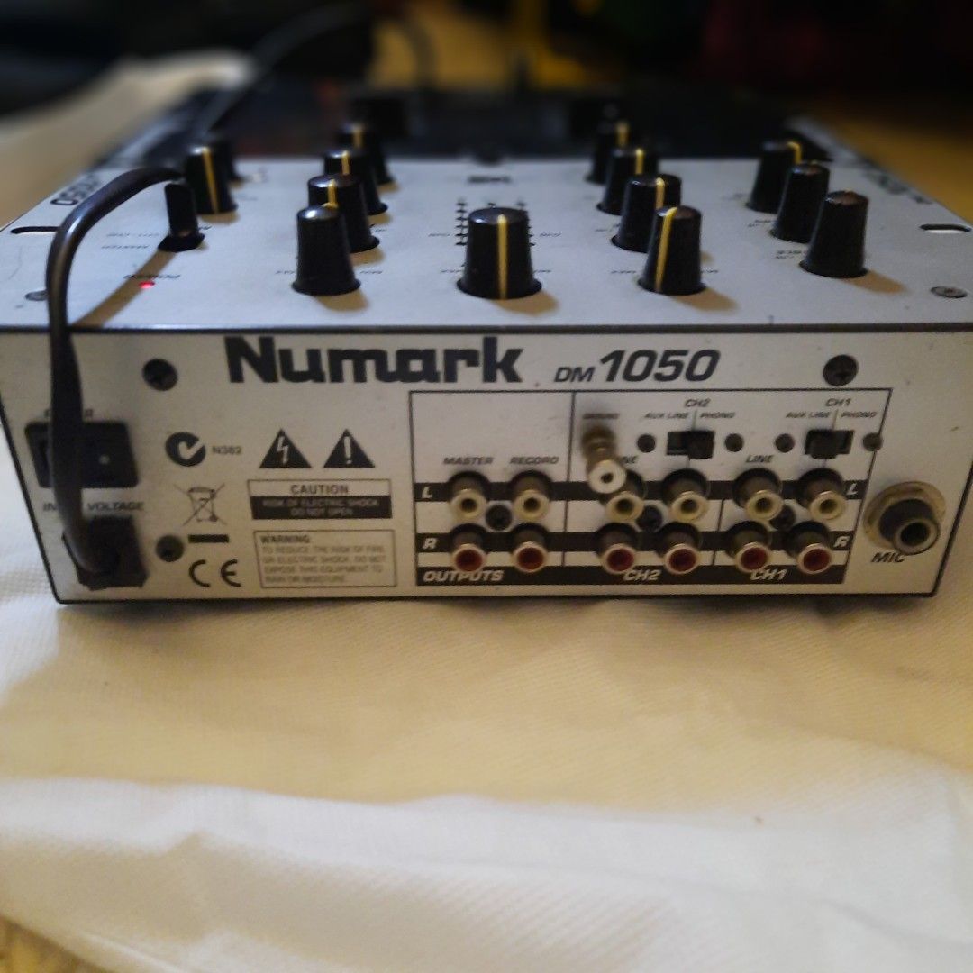 Numark DM 1050 DJ Mixer (Category: Other Audio Equipment) located in Quezon City. Submitted by cheap-finds (Listing ID 1456887260, Image 2). Description: NUMARK DM1050 DJ MIXER — 2-CHANNEL ₱4,000 - fixed price Pre-owned Numark DM1050 2-channel DJ mixer. A classic, straightforward DJ mixer suitable for home use, practice, casual DJing, or collectors of older DJ equipment. FEATURES: • 2-channel mixer • Phono/Line inputs • 3-band EQ per channel • Mi