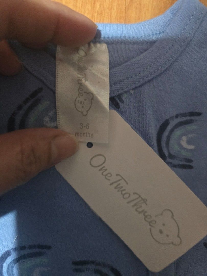One Two Three Baby Blue Rainbow Footed Romper 3-6 Months (Category: Babies & Kids Fashion) located in Las Pinas. Submitted by luxeprelovedstuff (Listing ID 1456906196, Image 3). Description: - Adorable light blue baby romper - Features a cheerful rainbow print - Long sleeves and cozy footies - Convenient full snap closure for easy dressing - Brand: One Two Three - Size: 3-6 months.