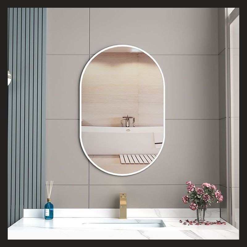 Oval Bathroom with Silver Frame (Category: Mirrors) located in Singapore. Submitted by aisellstuff (Listing ID 1456795708, Image 2). Description: - Modern oval mirror - Available in silver frame - Reflects light well and adds a stylish touch - Easy to mount - Ideal for above sink Size: 50 x 80cm (can be fixed horizontally or vertically).