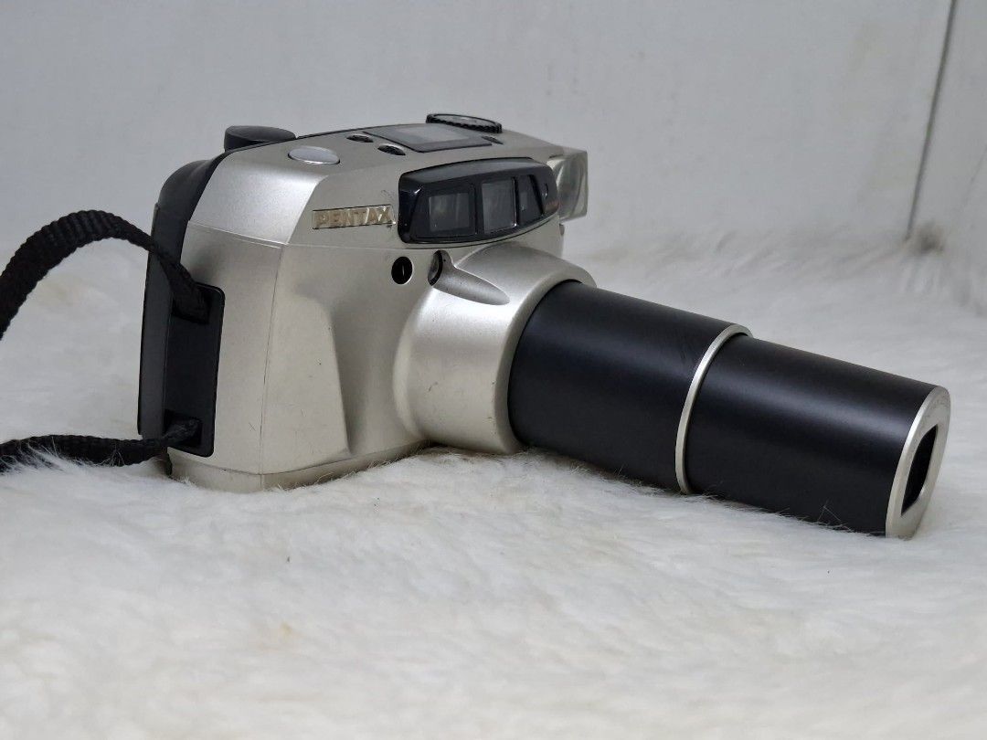 pentax iqzoom 160/espio 160 (Category: Cameras) located in Manila. Submitted by ultimogizmos (Listing ID 1456913362, Image 2). Description: The Pentax IQZoom 160 (also marketed as the Espio 160) is a compact 35mm autofocus point-and-shoot film camera It features a versatile 38mm–160mm zoom lens, built-in multi-mode flash, and automatic exposure handling in a pocketable yet chunky body. tested with dummy film working zoom working flash uses one cr