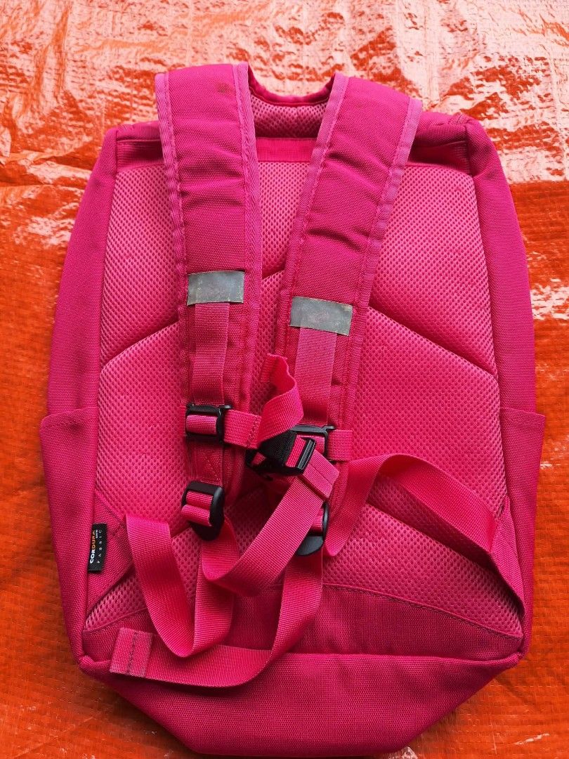 Pink Cordura Fabric Backpack with Multiple Pockets (Category: Backpacks) located in Malaybalay. Submitted by mags_sofia (Listing ID 1456910822, Image 2). Description: - Durable bright pink Cordura fabric - Main compartment - Front zippered pocket - Additional zippered pocket on front flap - Padded shoulder straps for comfort - Reflective strips on shoulder straps - Ideal for school or everyday adventures.
