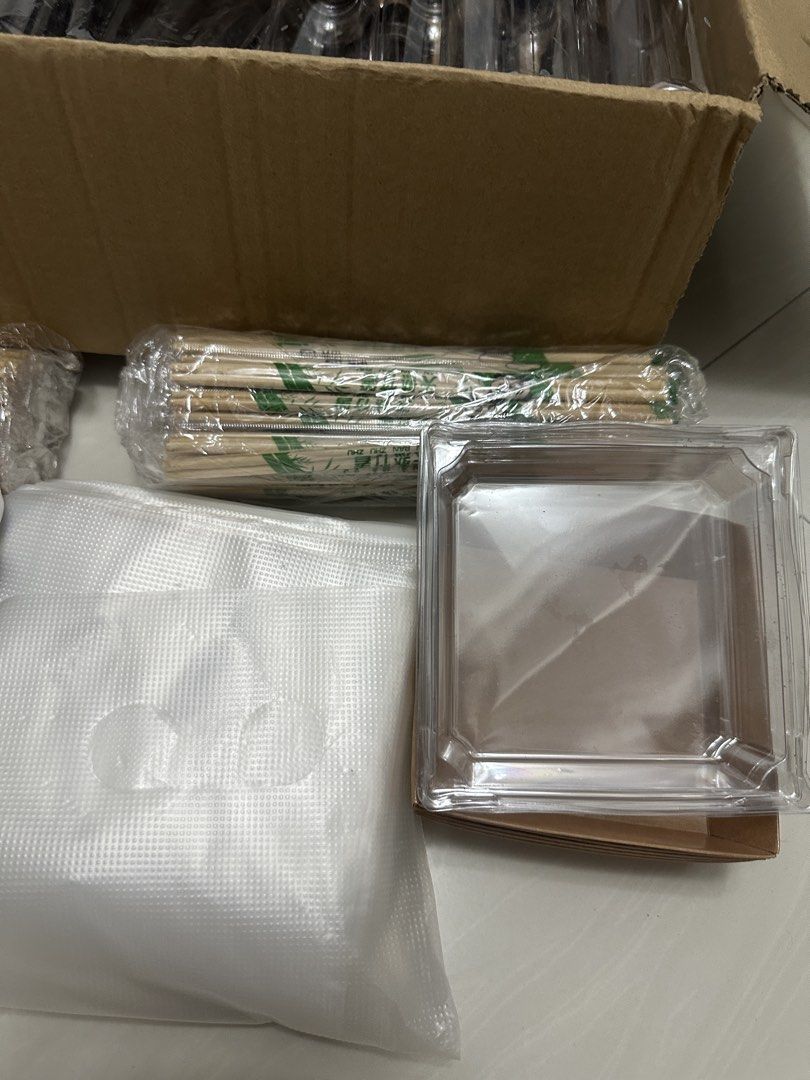 Packaging Plastic, Straws, Chopsticks, Plastic Bags & Stickers Set (Category: Craft Supplies & Tools) located in Bacoor. Submitted by ayayesha (Listing ID 1456798023, Image 3). Description: - Bundle includes: Clear plastic bottles with black caps, small and large black straws, individually wrapped chopsticks. - Also includes: Clear plastic bags and a roll of thank you stickers - All items are brand new and unused. .