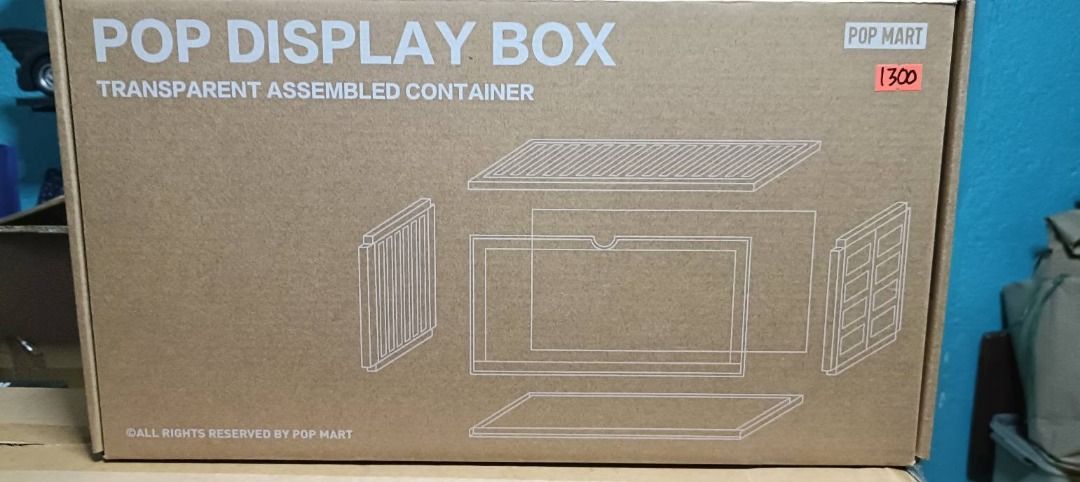 POP Mart Display Case Box (Category: Figurines & Statues) located in Manila. Submitted by theyellowsun (Listing ID 1456847943, Image 1). Description: This is the POP Mart Display Box Opened for inspection. Can be used for 6 inch figures like Marvel Legends. Too big for Mcfarlane figures unless you position them in a sitting position. 3rd picture used for reference. The display case is also stackable, meaning you can stack multiple display case on