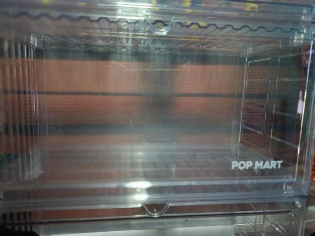 POP Mart Display Case Box (Category: Figurines & Statues) located in Manila. Submitted by theyellowsun (Listing ID 1456847943, Image 2). Description: This is the POP Mart Display Box Opened for inspection. Can be used for 6 inch figures like Marvel Legends. Too big for Mcfarlane figures unless you position them in a sitting position. 3rd picture used for reference. The display case is also stackable, meaning you can stack multiple display case on