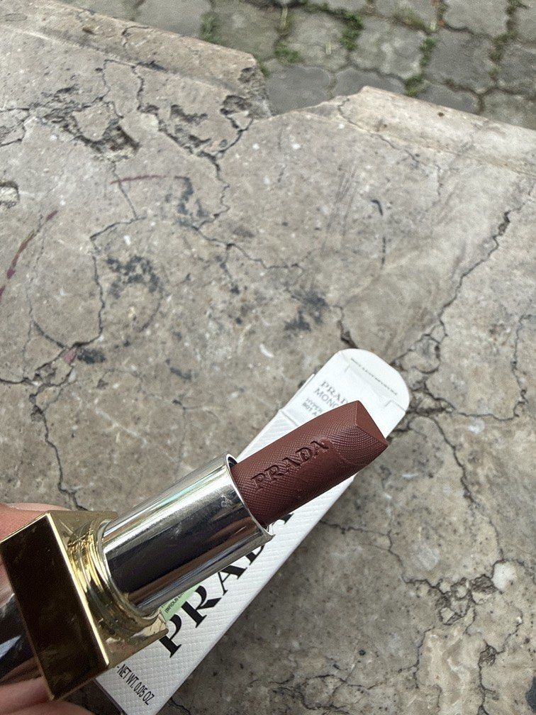 Prada Monochrome Hyper Matte B01 Argile Mini Lipstick (Category: Makeup) located in Angeles City. Submitted by migs_font29 (Listing ID 1456922665, Image 2). Description: - Prada Monochrome Hyper Matte Lipstick - Shade: B01 Argile (Matte Brown) - Size: Mini - Condition: Comes in original box - Perfect for adding a pop of color.