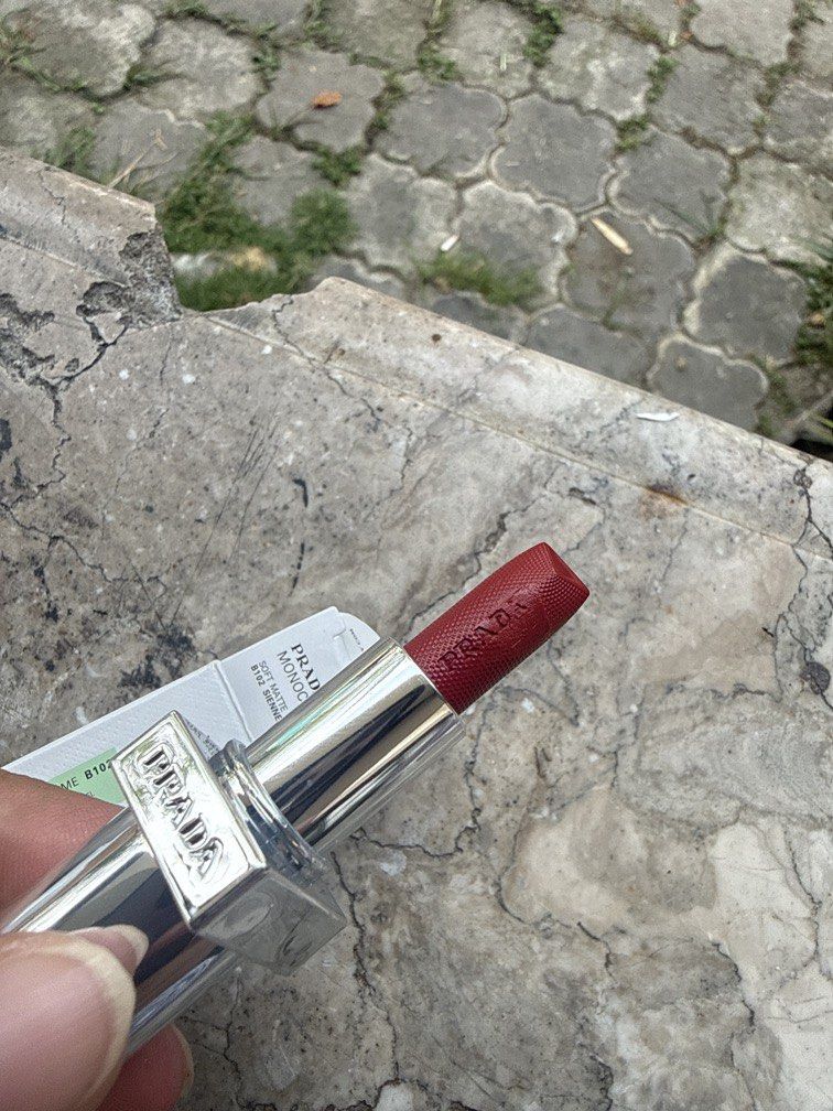 Prada Monochrome Mini Lipstick B102 Sienne Soft Matte (Category: Makeup) located in Angeles City. Submitted by migs_font29 (Listing ID 1456922748, Image 2). Description: - Prada Monochrome Mini Lipstick - Shade: B102 Sienne - Finish: Soft Matte - Size: Mini - Includes original box - Ideal for shade trial or travel.