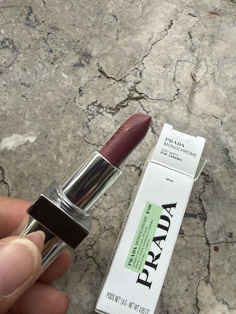 PRADA Monochrome Soft Matte Lipstick B106 Caramel Mini (Category: Makeup) located in Angeles City. Submitted by migs_font29 (Listing ID 1456922680, Image 2). Description: - Prada Monochrome Soft Matte Lipstick - Shade: B106 Caramel - Finish: Soft Matte - Size: Mini - Includes original box - Ideal for travel or testing the shade.