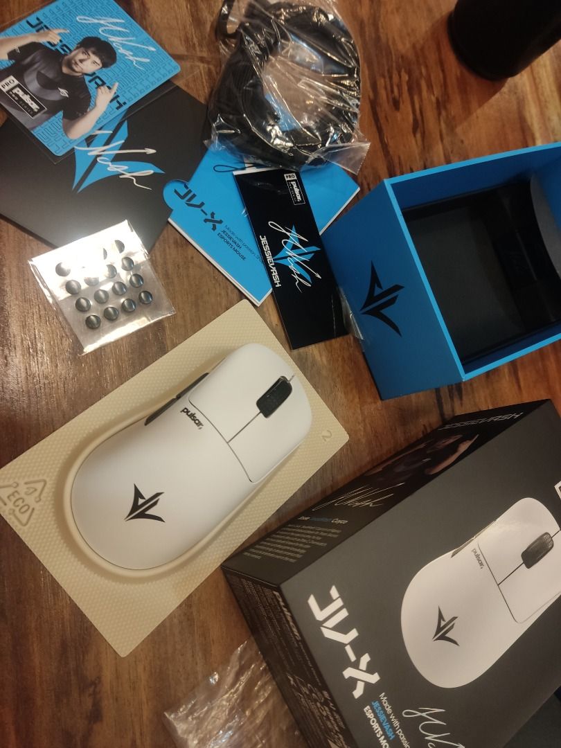 Pulsar JV-X Gaming Mouse White (Category: Mouse & Mousepads) located in Caloocan City. Submitted by fastrabbit.056be3 (Listing ID 1456886949, Image 1). Description: - Pulsar JV-X PRO SERIES Wireless Gaming Mouse - Color: White - Includes original box, charging cable, and extra mouse feet - Bonus: Signed card and stickers included - Perfect for an enhanced gaming experience.
