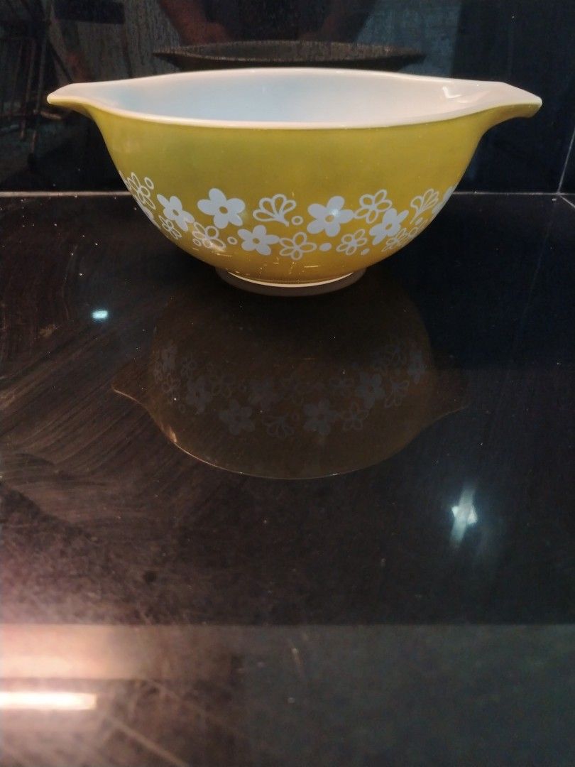 Pyrex Mixing Bowls - Vintage Floral Patterns (Category: Other Kitchenware & Tableware) located in San Juan City. Submitted by grandbird.a2b355 (Listing ID 1456790690, Image 1). Description: - Set of vintage Pyrex mixing bowls - Features classic yellow and orange floral patterns - Ideal for kitchen prep or decorative display - Iconic and collectible pieces.