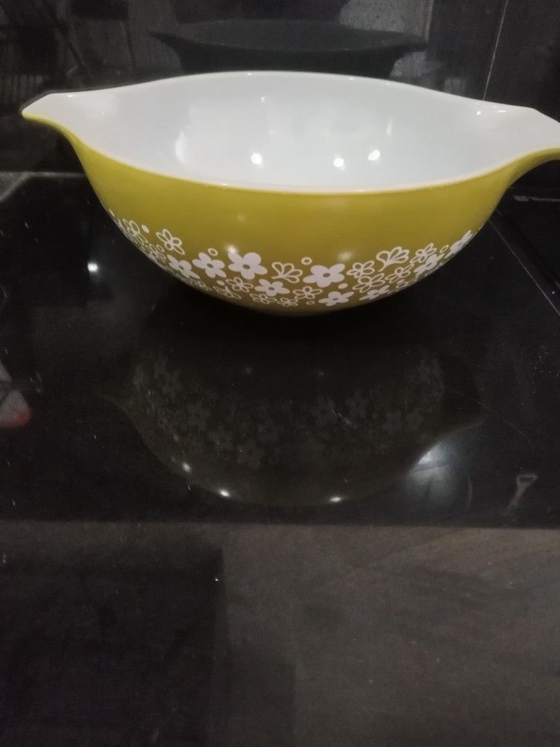 Pyrex Mixing Bowls - Vintage Floral Patterns (Category: Other Kitchenware & Tableware) located in San Juan City. Submitted by grandbird.a2b355 (Listing ID 1456790690, Image 2). Description: - Set of vintage Pyrex mixing bowls - Features classic yellow and orange floral patterns - Ideal for kitchen prep or decorative display - Iconic and collectible pieces.