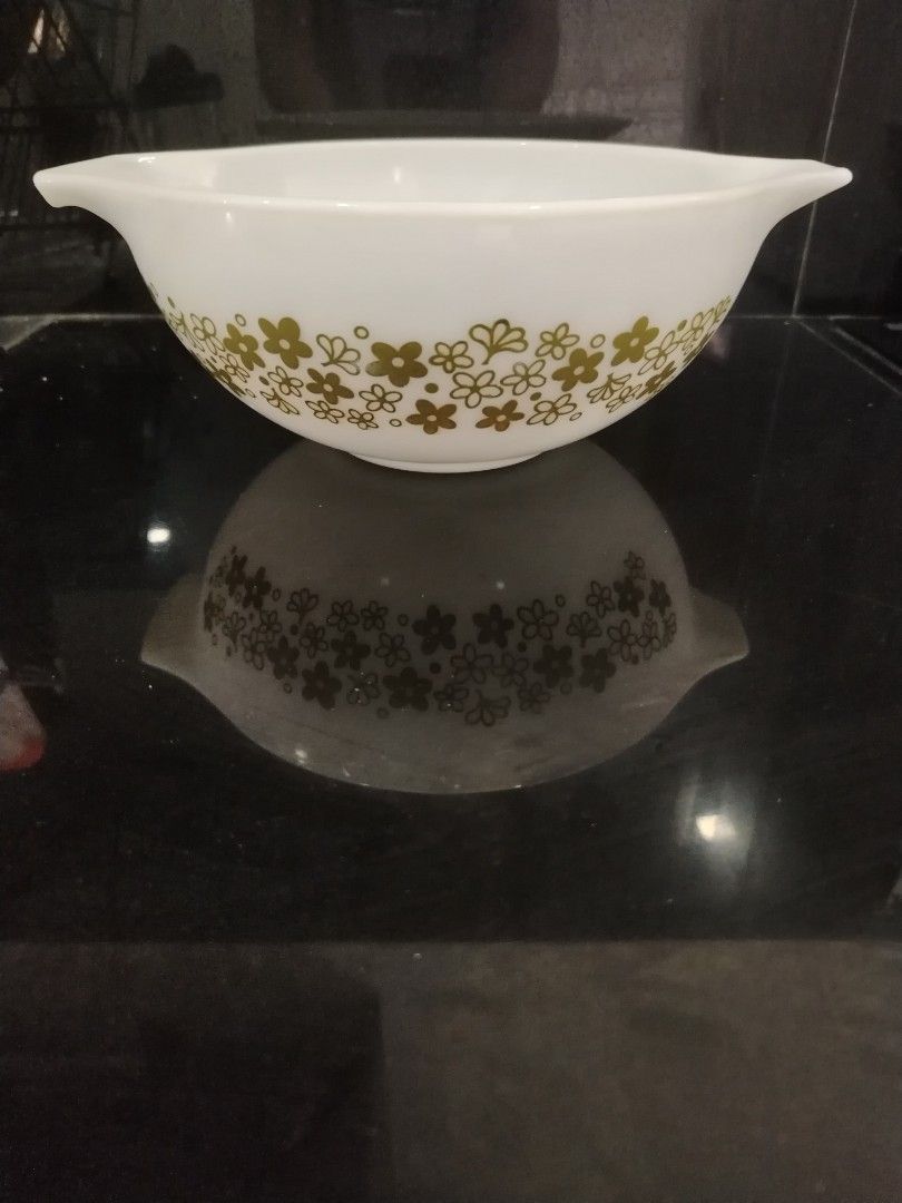 Pyrex Mixing Bowls - Vintage Floral Patterns (Category: Other Kitchenware & Tableware) located in San Juan City. Submitted by grandbird.a2b355 (Listing ID 1456790690, Image 3). Description: - Set of vintage Pyrex mixing bowls - Features classic yellow and orange floral patterns - Ideal for kitchen prep or decorative display - Iconic and collectible pieces.