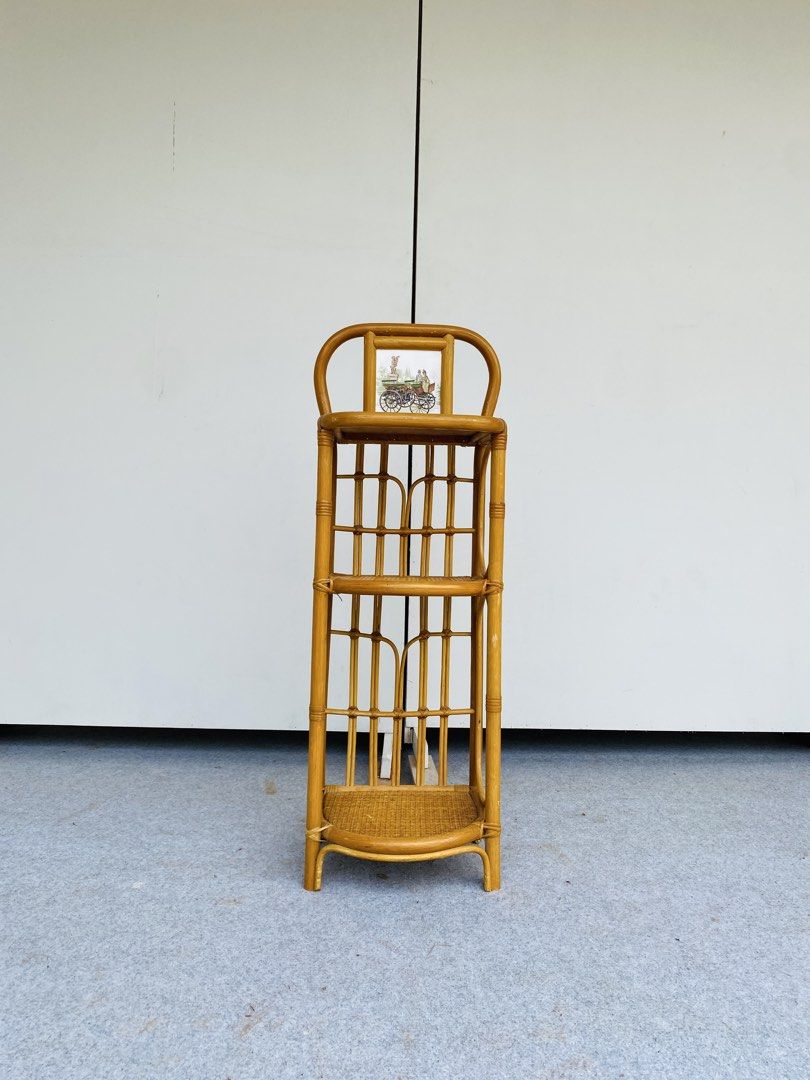 Rattan Side Table / Telephone Rack (Category: Tables & Sets) located in Manila. Submitted by elliefurnies31 (Listing ID 1456919867, Image 2). Description: "JAPAN SURPLUS" RATTAN SIDE TABLE / TELEPHONE STAND SIZE: 13L" x 11W" x 31-39H" inches (AS-IS ITEM) IN GOOD CONDITION.
