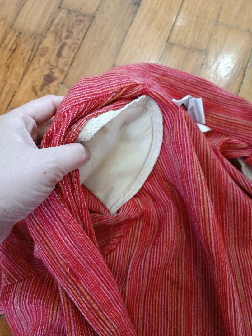 Red Striped Button-Up Cover Up with Pockets (Category: Blouses) located in Quezon City. Submitted by cheecharon (Listing ID 1456786324, Image 3). Description: - Red blouse with thin vertical stripes in pink and yellow. - Thick and comfortable fabric - Two front pockets and shoulder pads - Can be worn on its own or layered - Ideal for casual wear or work. - Never worn See 2nd and 3rd pic for more accurate color.