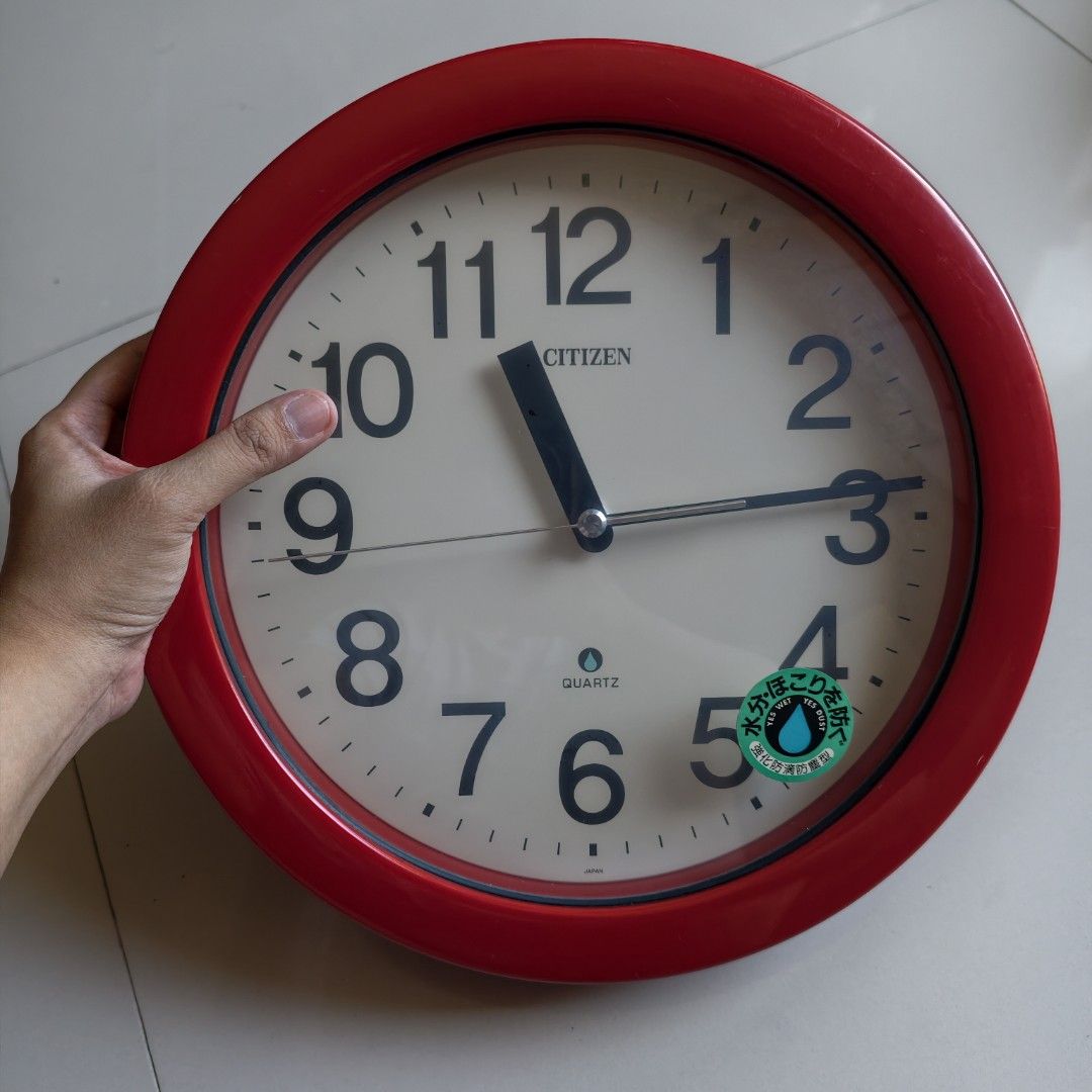 Retro Citizen Quartz Wall Clock (Category: Clocks) located in Pasig City. Submitted by millennialthrifter (Listing ID 1456798377, Image 1). Description: 🕰️ RETRO CITIZEN QUARTZ WALL CLOCK - 1499 A timeless piece featuring a bold glossy red frame and a clean, minimalist dial with oversized numerals for excellent readability. ✅ Original Citizen Clock ✅ Made in Japan 🇯🇵 ✅Size: 11 inches diameter ✅A perfect statement piece for your home, office, c