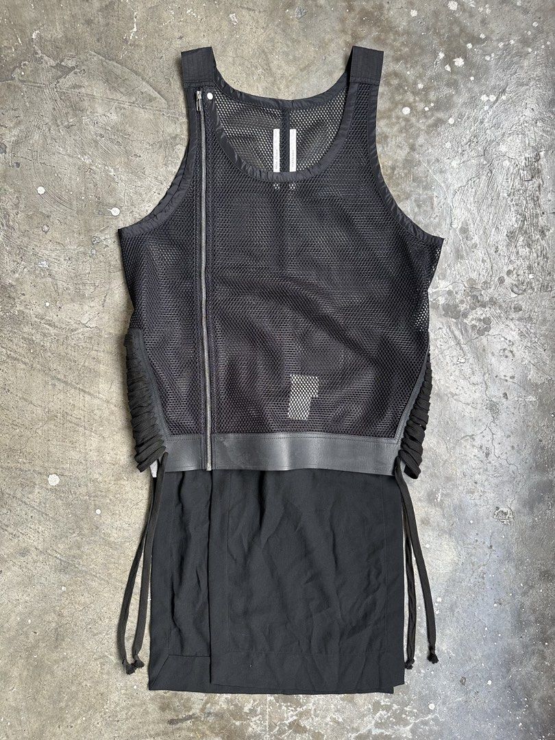 Rick Owens - S/S 14 - Mesh Zip Tank Top (Category: Tshirts & Polo Shirts ) located in Manila. Submitted by graymatter_ (Listing ID 1456911096, Image 2). Description: Rick Owens - S/S 14 - Mesh Zip Tank Top Tagged Size: M Condition: 9/10 Material: 100% Polyester, 100% Cotton, Cow Leather Zipper: YKK Made in: Italy Dimensions Length: 38.5 Width: 21.5 Shoulder: 13.5.