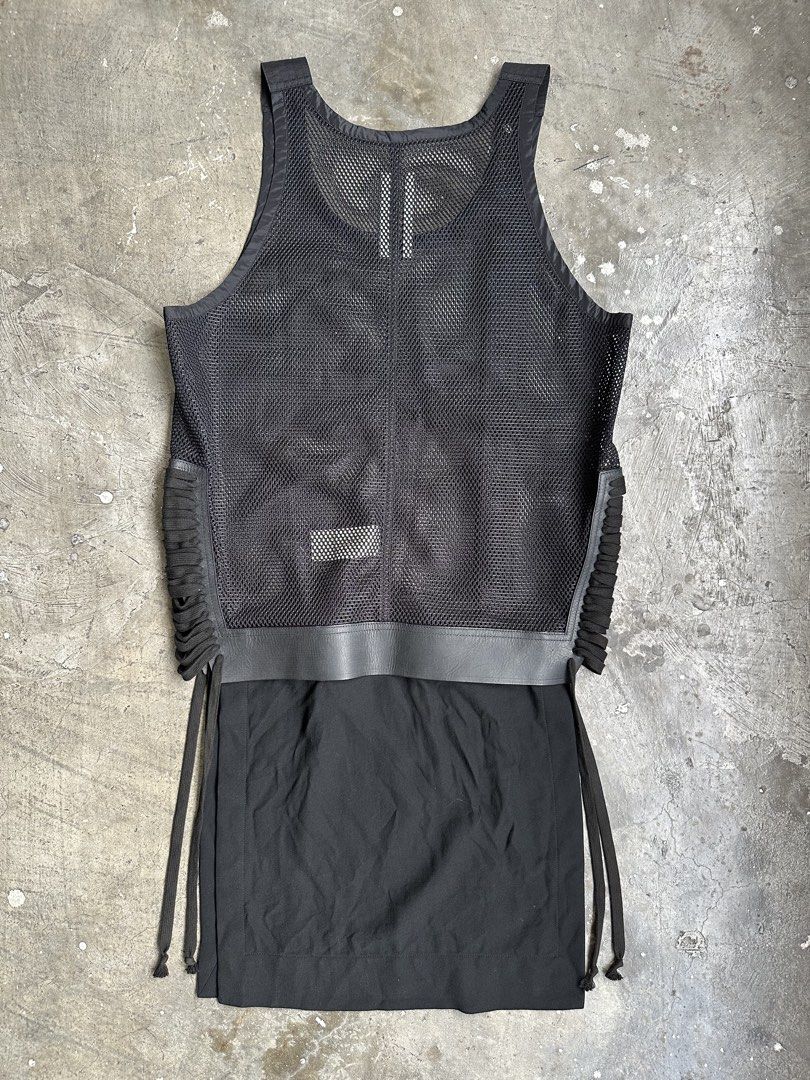 Rick Owens - S/S 14 - Mesh Zip Tank Top (Category: Tshirts & Polo Shirts ) located in Manila. Submitted by graymatter_ (Listing ID 1456911096, Image 3). Description: Rick Owens - S/S 14 - Mesh Zip Tank Top Tagged Size: M Condition: 9/10 Material: 100% Polyester, 100% Cotton, Cow Leather Zipper: YKK Made in: Italy Dimensions Length: 38.5 Width: 21.5 Shoulder: 13.5.