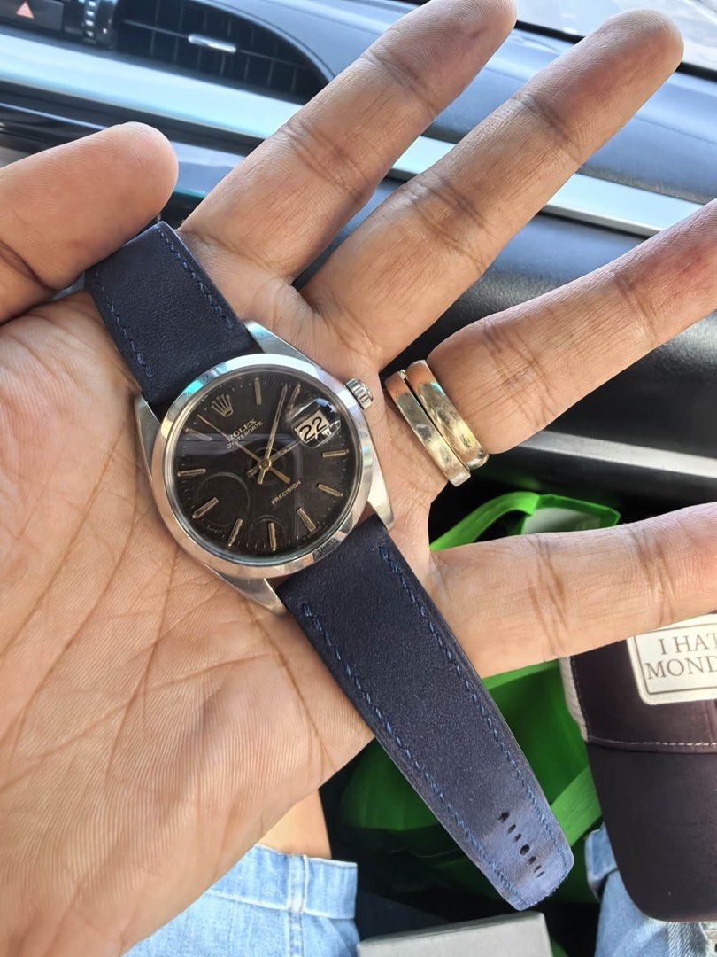 Rolex Oysterdate Precision Watch (Category: Luxury Watches) located in Cabanatuan. Submitted by albertgonzales27 (Listing ID 1456909208, Image 2). Description: - Vintage Rolex Oysterdate Precision - Classic black dial with date window - Durable stainless steel case - Comes with a stylish blue leather strap - Shows some signs of wear on case and crystal (selling as is).