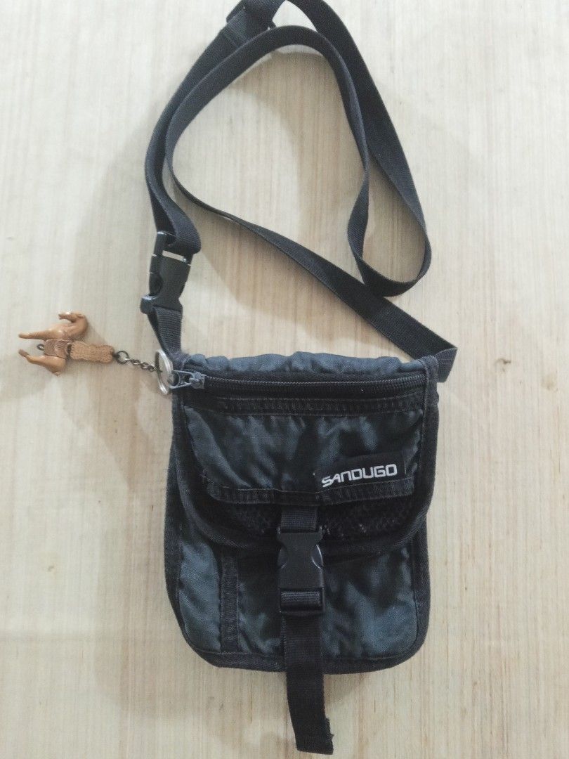 Sandugo Black Tactical Crossbody Pouch (Category: Belt bags, Clutches and Pouches) located in Bulacan. Submitted by danielstorm (Listing ID 1456951092, Image 1). Description: Sandugo Black Tactical Crossbody Pouch Price: PHP 65 ​Details: Sandugo black utility crossbody pouch with front buckle compartment. Selling low as is. ​Terms and Shipping: Location: Sta Maria, Bulacan Shipping: Lalamove ONLY (Buyer books and pays shipping fee) Payment: Cash,