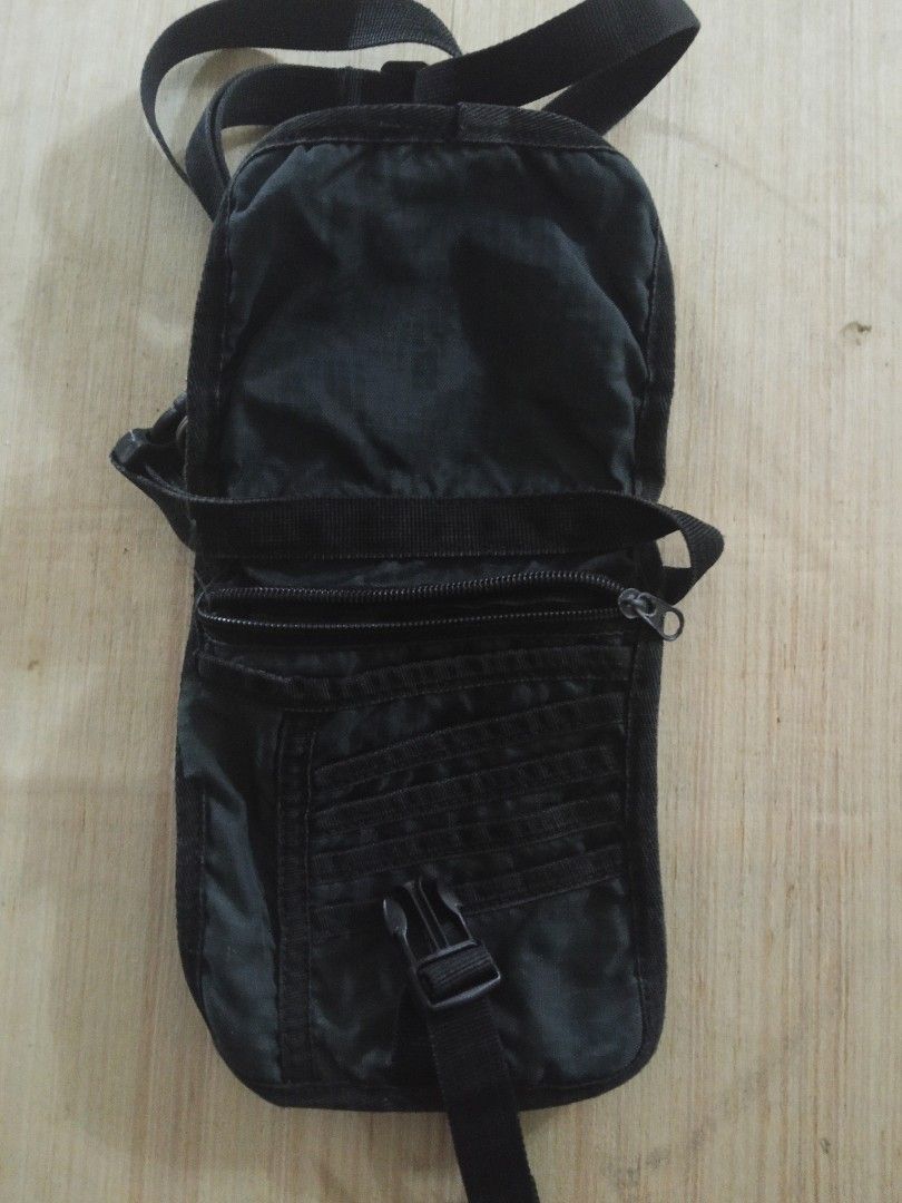 Sandugo Black Tactical Crossbody Pouch (Category: Belt bags, Clutches and Pouches) located in Bulacan. Submitted by danielstorm (Listing ID 1456951092, Image 3). Description: Sandugo Black Tactical Crossbody Pouch Price: PHP 65 ​Details: Sandugo black utility crossbody pouch with front buckle compartment. Selling low as is. ​Terms and Shipping: Location: Sta Maria, Bulacan Shipping: Lalamove ONLY (Buyer books and pays shipping fee) Payment: Cash,