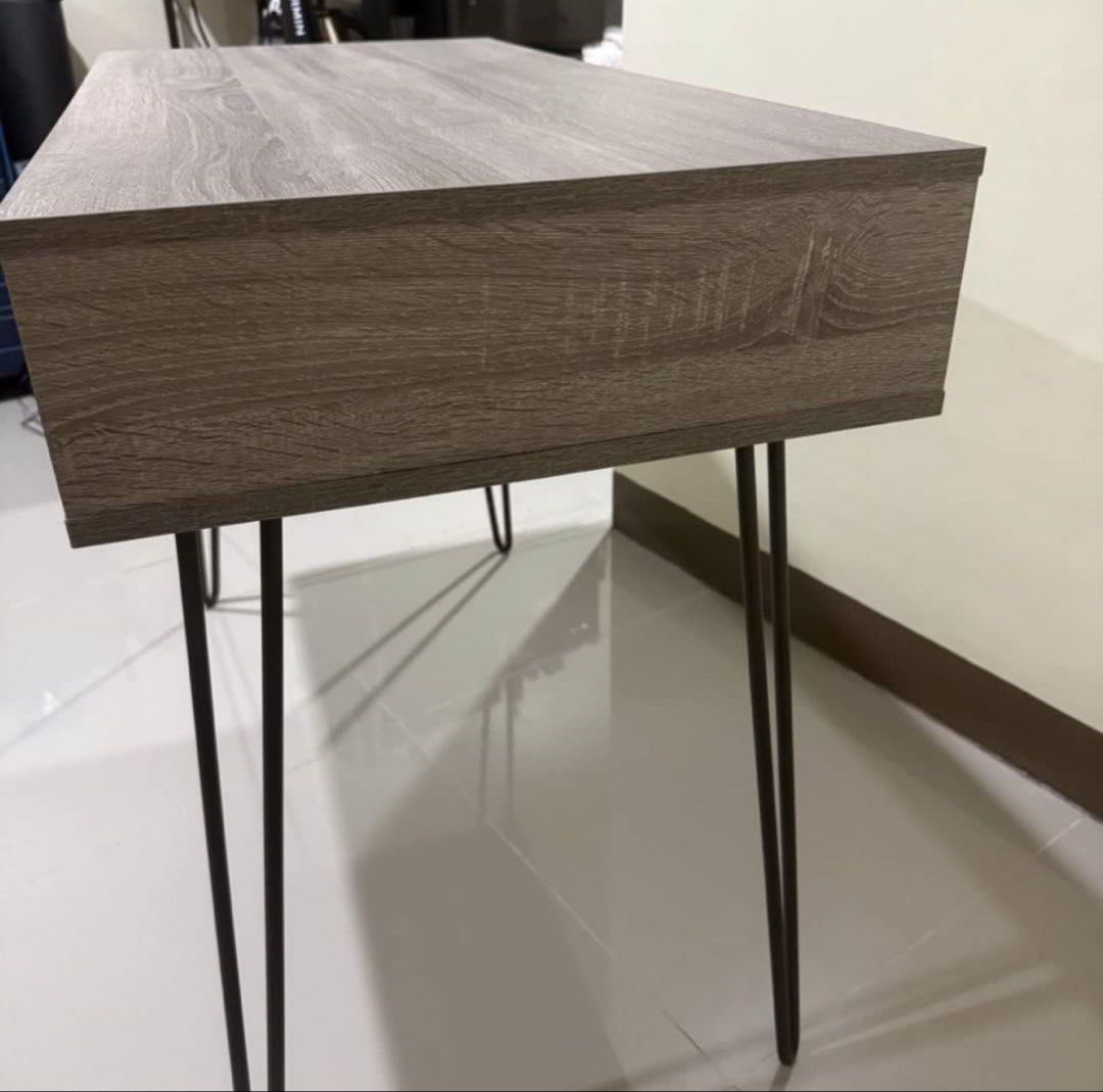 San-Yang Computer Table (Category: Office Furniture & Fixtures) located in Quezon City. Submitted by just.thingss (Listing ID 1456882339, Image 3). Description: Description: Selling my San-Yang Computer Table (100CM) in Ash finish. I bought this last November 2025, and it is still in good as new condition. No issues, scratches, or wobbles. Reason for Selling: I’ll move to a new apartment. Price Details: • Original Price: Php 3,395 • Sale and Last