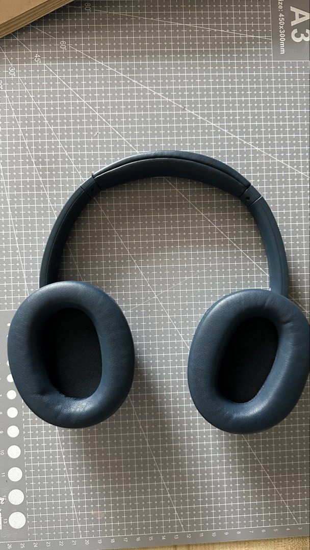 Sony WH-CH720N Headphones (Category: Headphones & Headsets) located in San Pedro. Submitted by objectdecay (Listing ID 1456846820, Image 1). Description: - Brand: Sony - Model: WH-CH720N - Color: Navy Blue - Condition: 7/10. Leather cracks on ear cushion.