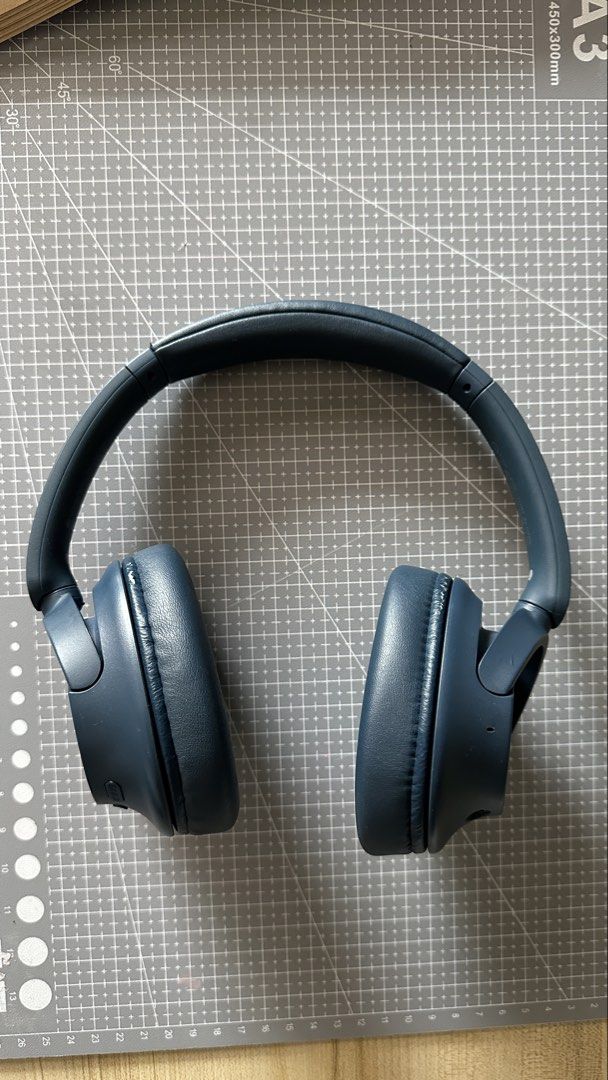 Sony WH-CH720N Headphones (Category: Headphones & Headsets) located in San Pedro. Submitted by objectdecay (Listing ID 1456846820, Image 3). Description: - Brand: Sony - Model: WH-CH720N - Color: Navy Blue - Condition: 7/10. Leather cracks on ear cushion.