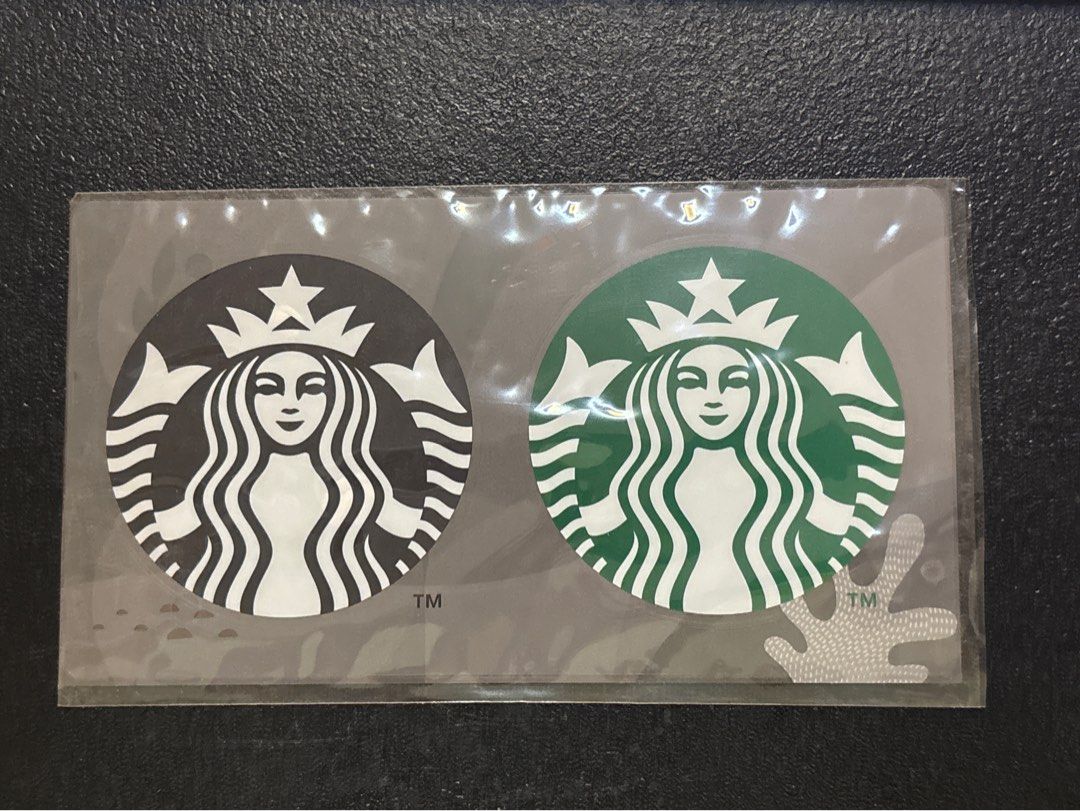 STARBUCKS Sticker SEALED (Category: Toys & Collectibles) located in Malabon City. Submitted by luxgoals (Listing ID 1456782314, Image 1). Description: - Brand new, sealed Starbucks stickers - Features two iconic Siren logo designs - One sticker in classic black and white - One sticker in signature Starbucks green - Ideal for decorating laptops, tumblers, and more - 3 inch radius.