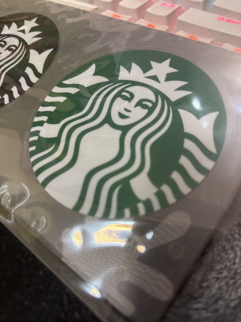 STARBUCKS Sticker SEALED (Category: Toys & Collectibles) located in Malabon City. Submitted by luxgoals (Listing ID 1456782314, Image 3). Description: - Brand new, sealed Starbucks stickers - Features two iconic Siren logo designs - One sticker in classic black and white - One sticker in signature Starbucks green - Ideal for decorating laptops, tumblers, and more - 3 inch radius.