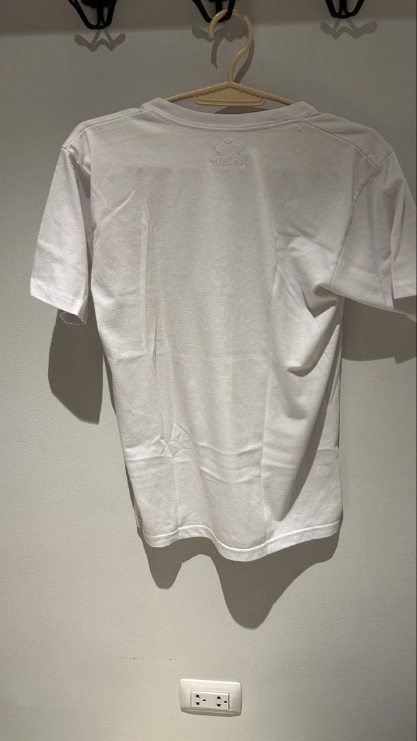 Stranger Things T-shirt White Seashop (Category: Tshirts & Polo Shirts ) located in Manila. Submitted by emiluh (Listing ID 1456918912, Image 2). Description: - White Stranger Things t-shirt - Size: Medium, relaxed fit - Small stain on the front right side (as pictured) - loose threads around neckline area - Great for Stranger Things fans!.