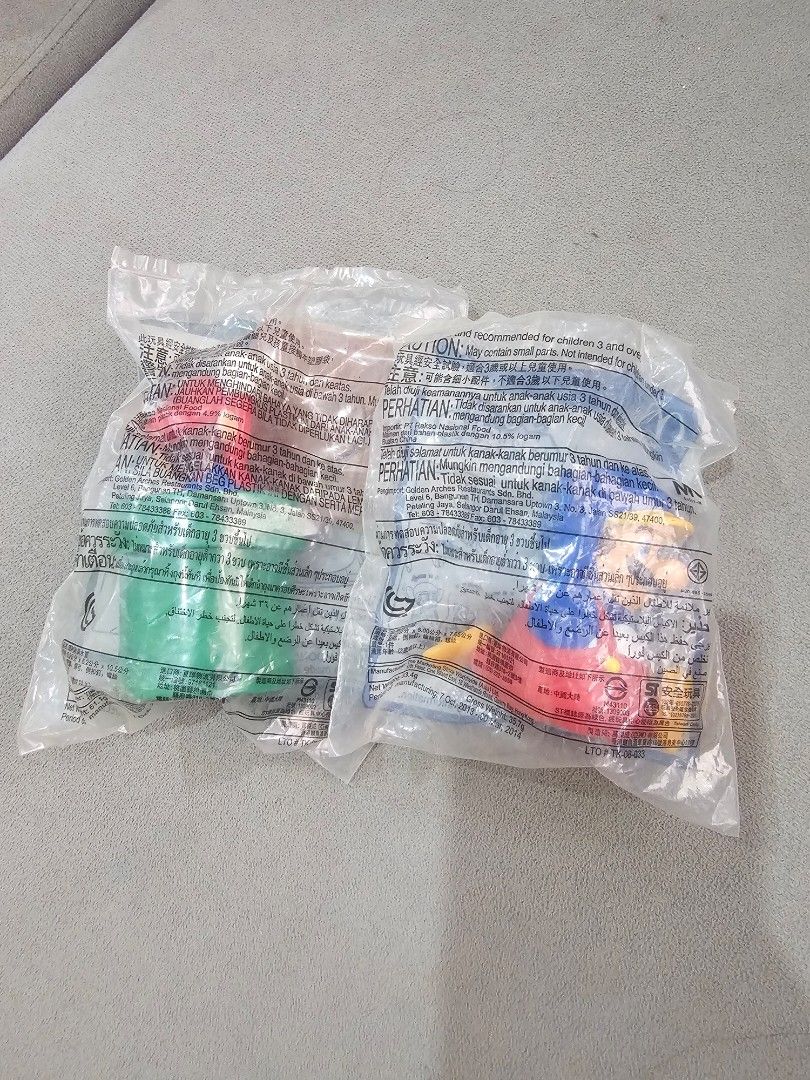 Super Mario Happy Meal Toys (Category: Character Goods) located in Manaoag. Submitted by dressupdear (Listing ID 1456799952, Image 2). Description: 60 PESOS EACH or BUY BOTH FOR 100 PESOS. Sealed includes - Mario with Pipe - Penguin Mario.