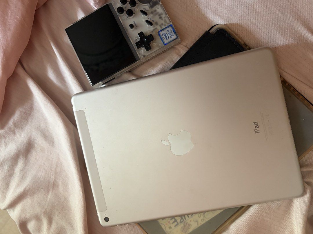 TAKE ALL iPad Air 2 and Gameboy (Category: iPad) located in Pasig City. Submitted by seleneaki (Listing ID 1456828547, Image 3). Description: - Silver iPad Air 2 - 128GB Storage - Wi-Fi + Cellular - Running iPadOS 15.8.4 - Comes with a black case - lady-owned. Still runs smoothly - Ideal for light browsing, games, and apps - Gameboy Anbernic RG35XX i3 9th gen with 128gb preloaded games.