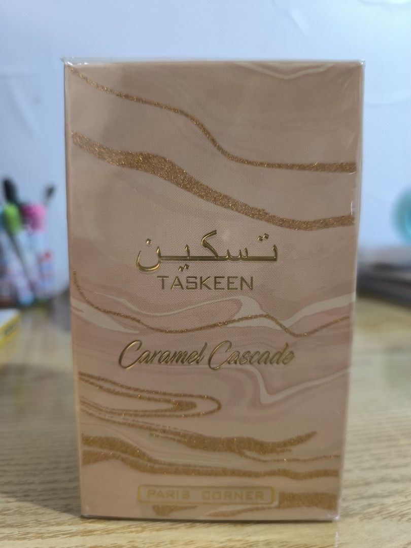 Taskeen Caramel Cascade Eau De Parfum (100ml) by Paris Corner (Category: Fragrance & Deodorants) located in Cavite. Submitted by iammrsdr (Listing ID 1456892175, Image 1). Description: Authentic with 3D sticken and QR code sealed Location: Tanza ,Cavite.